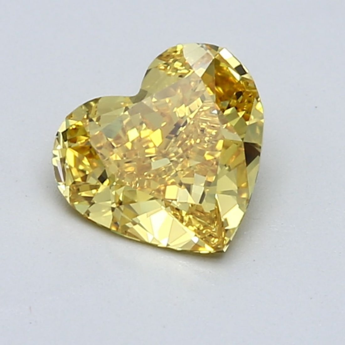 GIA Heart 1.23ct Fancy Vivid Orangey Yellow IF - Loose Natural Diamond: GIA Heart 1.23ct Fancy Vivid Orangey Yellow IF - Loose Natural Diamond GIA-certified, this 1.23ct Fancy Vivid Orangey Yellow IF diamond boasts exceptional clarity and polish, with a vibrant orangey hu