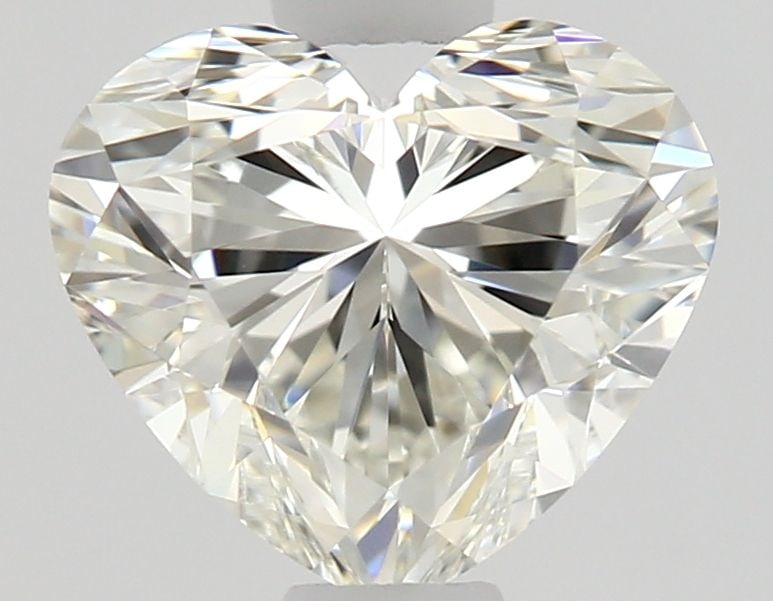 GIA Heart 0.71ct I VVS1 - Loose Natural Diamond: GIA Heart 0.71ct I VVS1 - Loose Natural Diamond GIA certification ensures the authenticity of this 0.71ct I VVS1 diamond. Its EX polish and VG symmetry showcase exceptional clarity and cut quality. A 