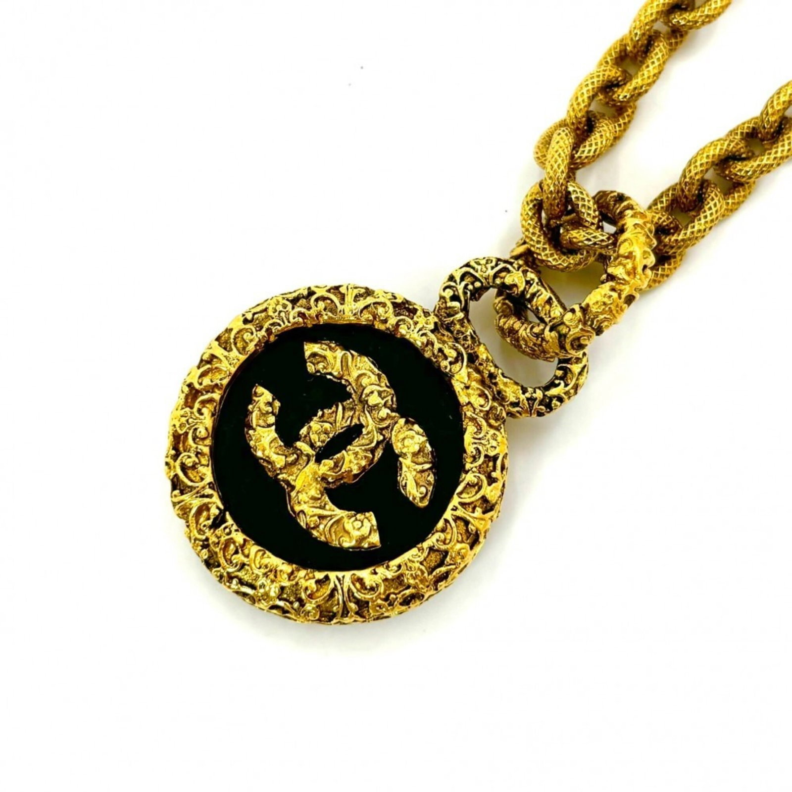CHANEL Black Necklace: CHANEL Black Necklace Black Chanel Necklace with 35mm x 35mm Pendant, 10mm Width, and 64 cm Neck Circumference. This used Chanel necklace features a 35mm x 35mm pendant and has a 10mm width, making it