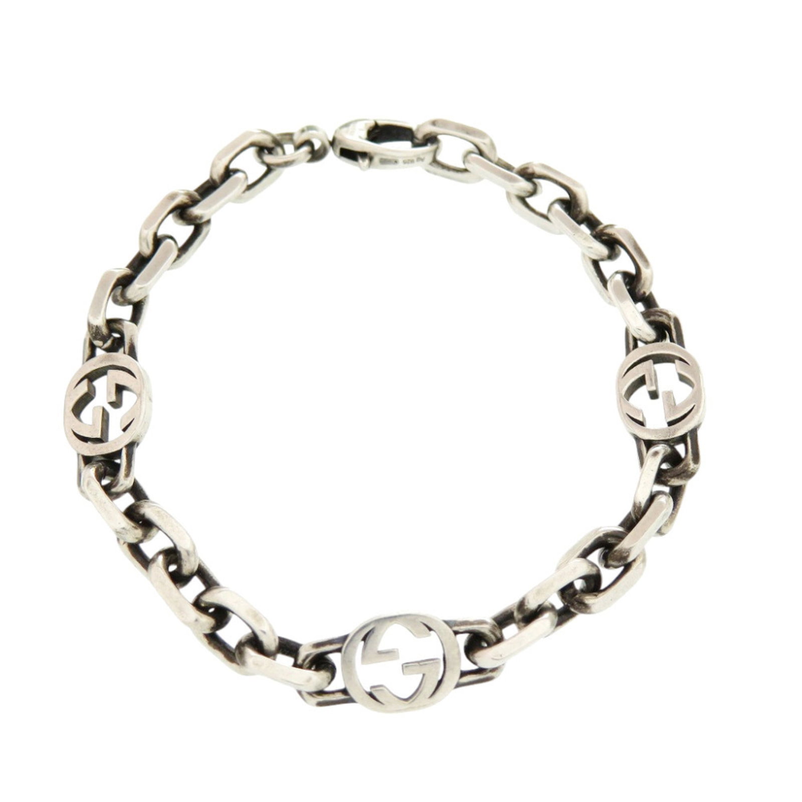GUCCI Charm Bracelet Silver 925: GUCCI Charm Bracelet Silver 925 Silver 925 charm bracelet from Gucci, crafted in Italy with a sleek 19cm design. The gently used piece features minor signs of wear, including small scratches or light