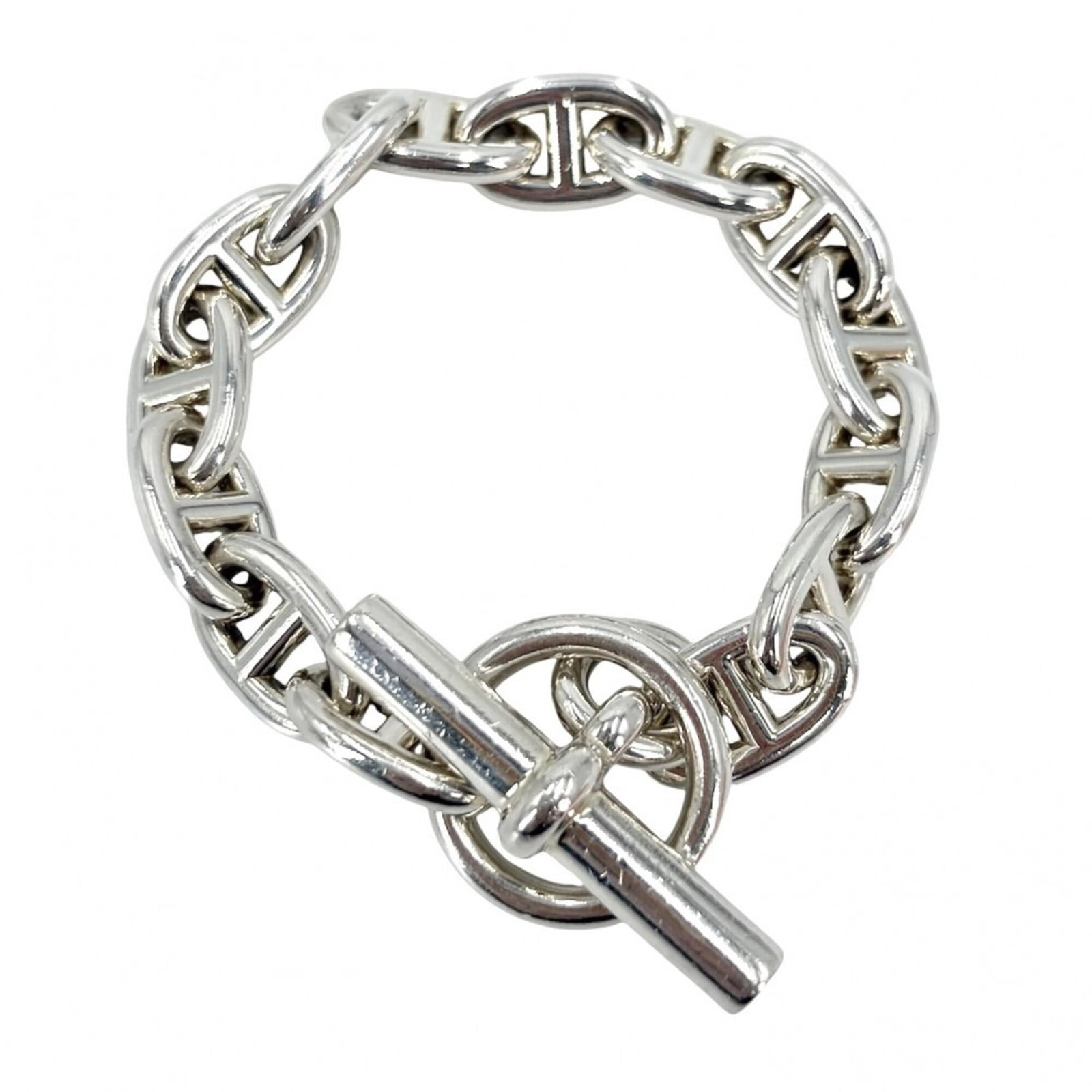HERMES Charm Bracelet Silver 925: HERMES Charm Bracelet Silver 925 Silver 925 Charm Bracelet from Hermes, featuring a 15cm length with visible signs of wear, including scratches and scuffs. This used charm bracelet is in good overall
