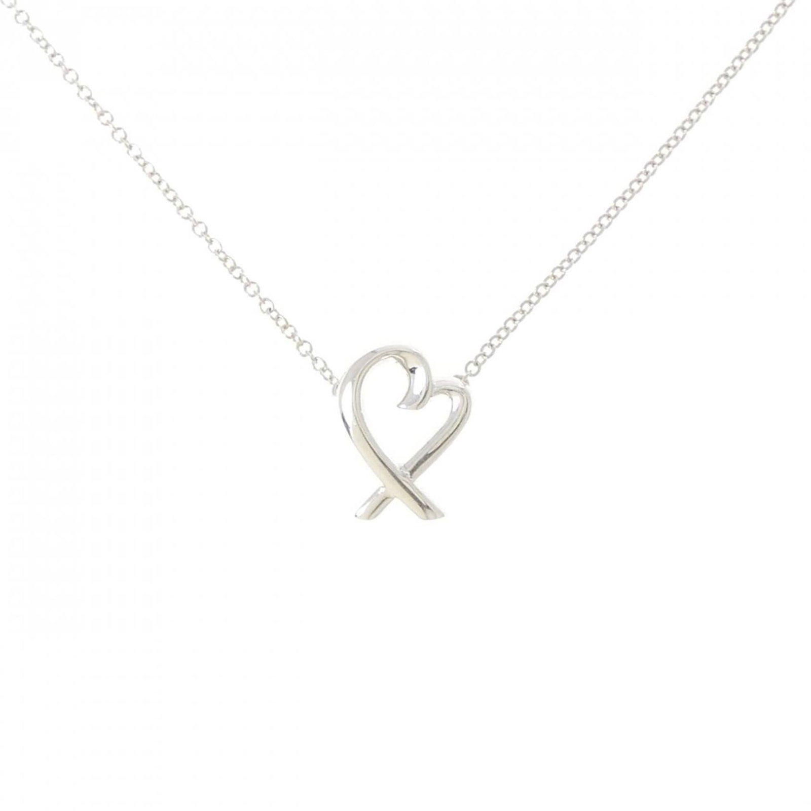 TIFFANY Silver 925: TIFFANY Silver 925 Silver 925 pendant from Tiffany, gently used with minor signs of wear, bearing a signature. The pendant features a 11.6mm x 8.8mm design with a 41 cm / 16.14'' chain. In very good