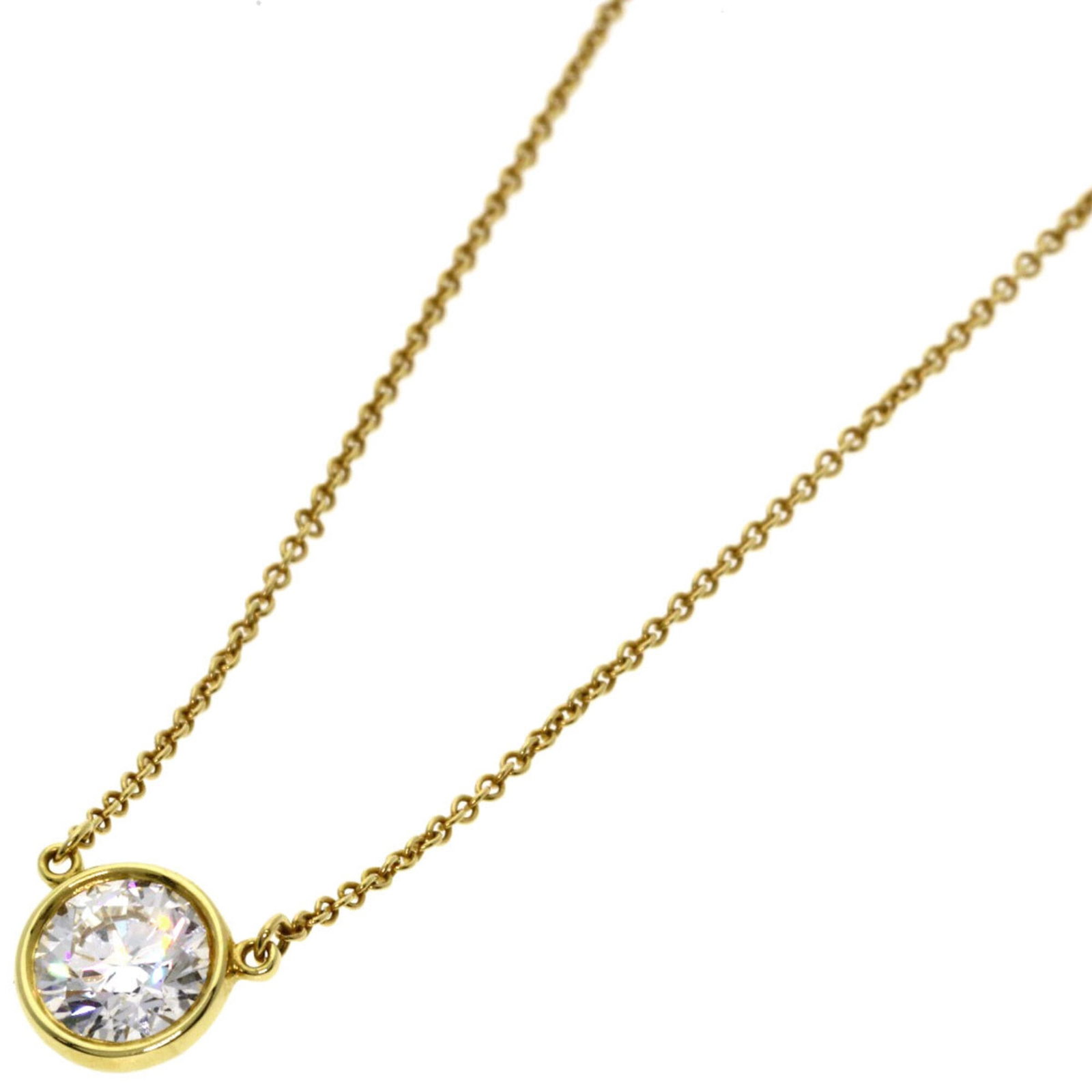 TIFFANY Yellow Gold (18K): TIFFANY Yellow Gold (18K) Yellow gold (18K) Tiffany necklace with a diamond pendant, featuring a 41 cm circumference and a 7.6mm x 7.6mm diamond pendant. This gently used necklace is presented in a