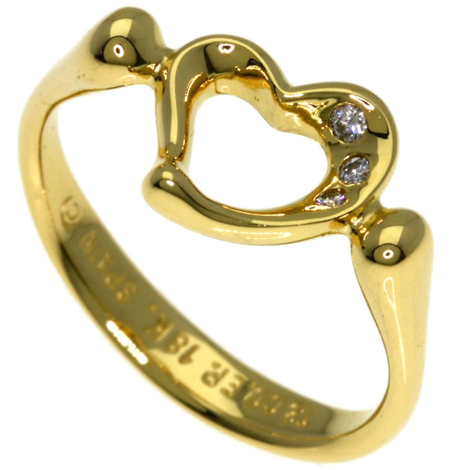 TIFFANY Band Ring Yellow Gold (18K): TIFFANY Band Ring Yellow Gold (18K) Yellow gold (18K) band ring from Tiffany, featuring a diamond stone, is a gently used piece in very good condition. The ring bears minor signs of wear, with small