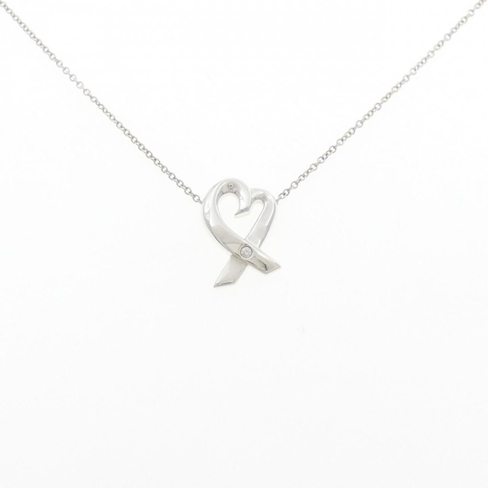 TIFFANY Silver 925: TIFFANY Silver 925 Silver pendant featuring a diamond, crafted from 925 sterling silver, with a 41 cm circumference and a pendant size of 15.6mm x 10.9mm. This like-new necklace is made from high-qual