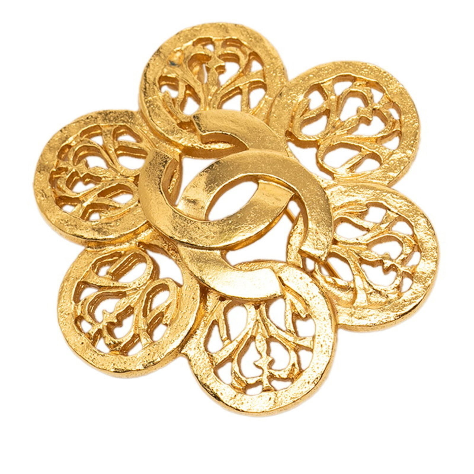 CHANEL Brooch Gold: CHANEL Brooch Gold Gold Chanel Brooch, 4.7cm x 3.9cm, Very Good Condition. This gently used brooch features a gold finish with minor scratches or light marks, showcasing a classic design from the