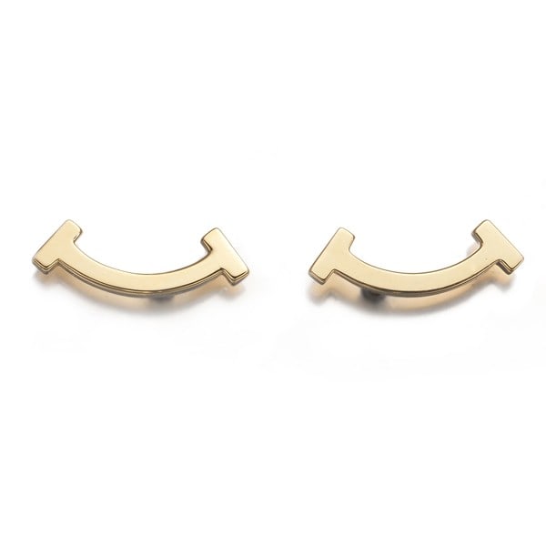 Tiffany&Co. Earrings Tiffany T Smile Mini 18K 750 Yellow Gold: Tiffany&Co. Earrings Tiffany T Smile Mini 18K 750 Yellow Gold Tiffany & Co.'s 18k yellow gold Tiffany T Smile Mini earrings are a delicate and elegant accessory. With a design size of 4.5 x 13.3mm, th