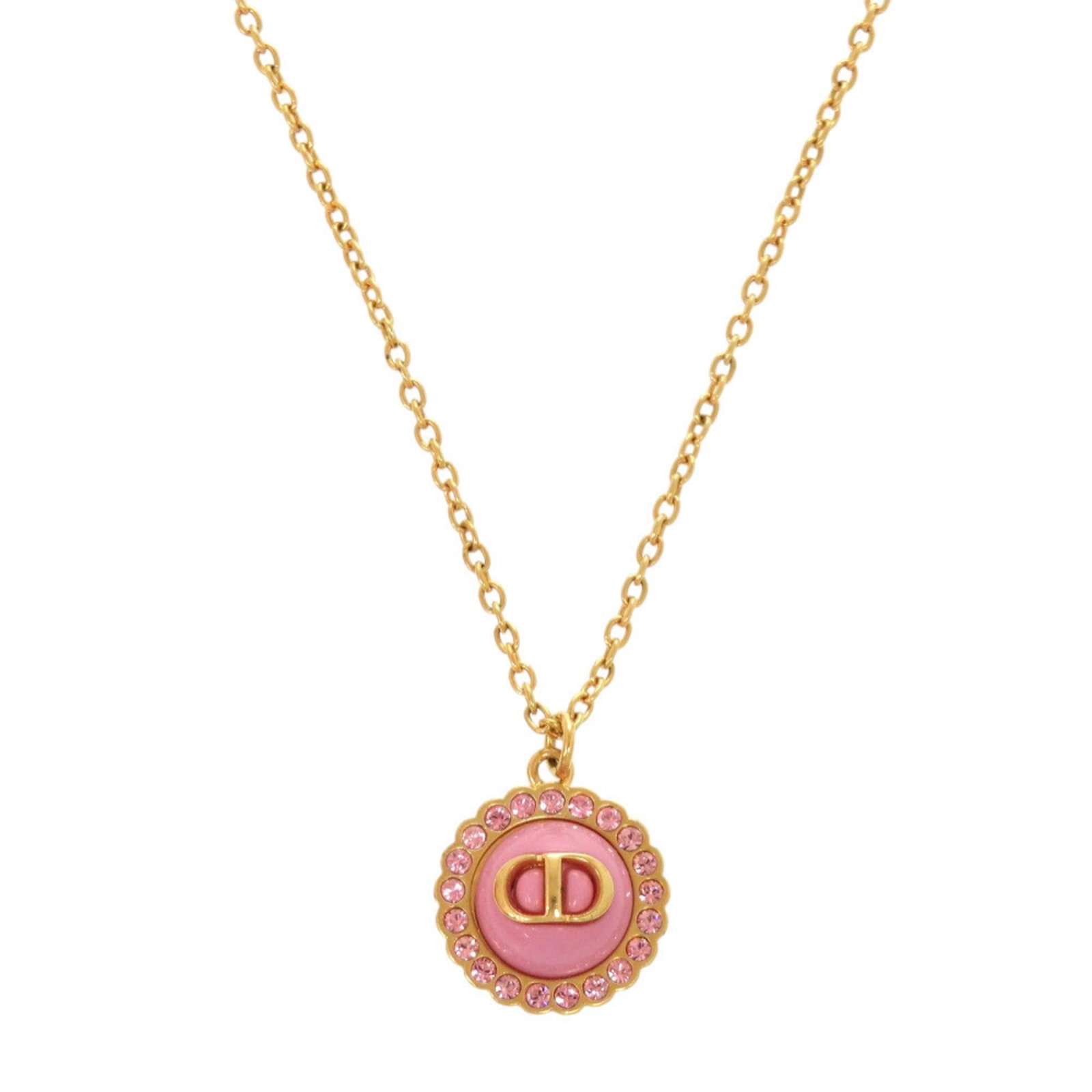 CHRISTIAN DIOR Metal: CHRISTIAN DIOR Metal Gently used Christian Dior metal necklace in gold and pink, featuring a 14mm x 14mm pendant, available in a 45 cm / 17.71'' adjustable neck circumference. The necklace bears minor