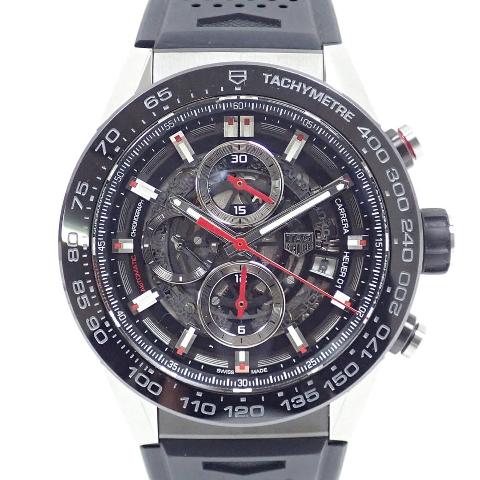 TAG HEUER Wristwatch Stainless Steel: TAG HEUER Wristwatch Stainless Steel Stainless steel construction and automatic self-winding movement make this Tag Heuer watch a reliable timepiece. The black dial and rubber band provide a sleek,