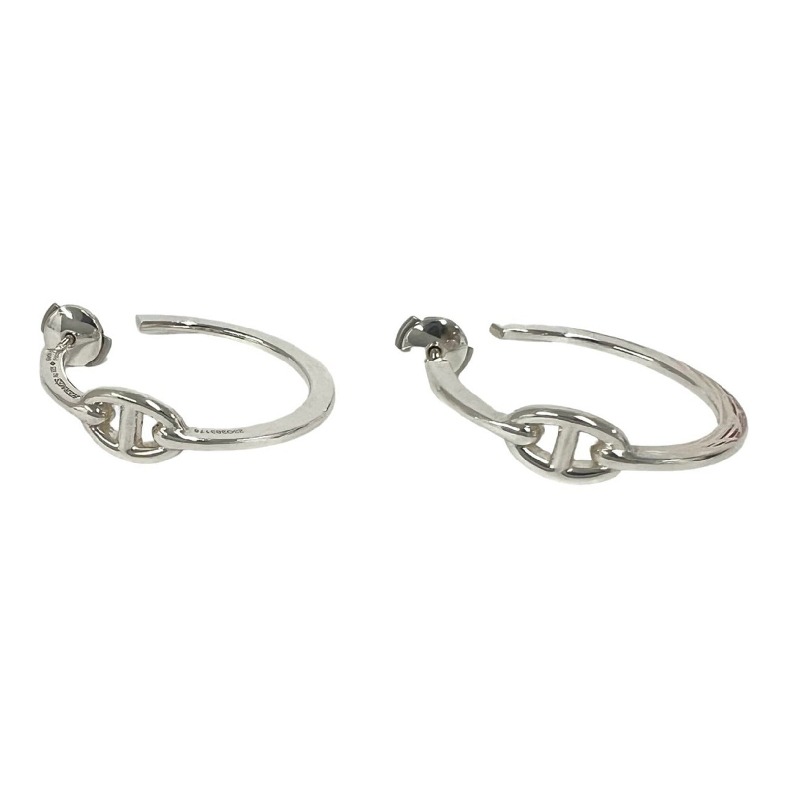 HERMES Hoop Earrings Silver 925: HERMES Hoop Earrings Silver 925 Silver 925 Hoop Earrings from Hermes feature a sleek and modern design. Made from high-quality silver, these earrings showcase a classic style with a subtle shine. With