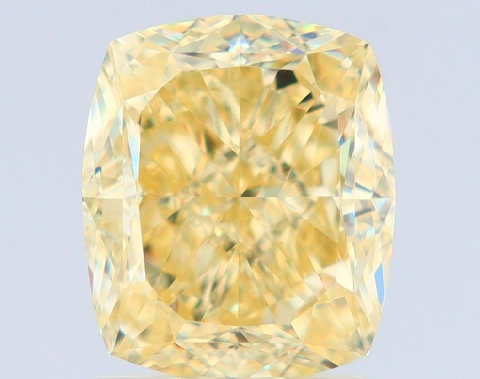 GIA Cushion Brilliant 2.01ct Fancy Yellow VVS2 - Loose Natural Diamond: GIA Cushion Brilliant 2.01ct Fancy Yellow VVS2 - Loose Natural Diamond GIA-certified, this 2.01ct Fancy Yellow VVS2 diamond boasts exceptional clarity and a vibrant, sunny hue. Its EX polish and VG