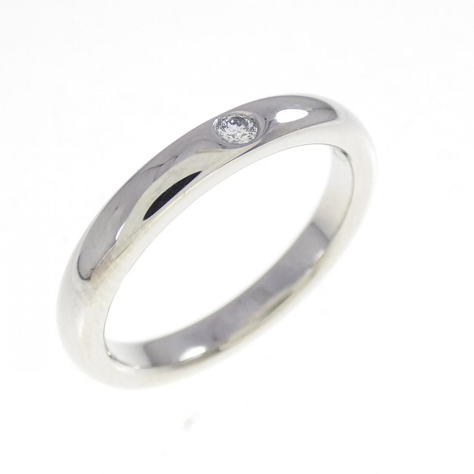 TIFFANY Band Ring Platinum 950: TIFFANY Band Ring Platinum 950 Platinum 950 Tiffany Band Ring with Diamond Stone. Gently used, this band ring features a diamond stone set in platinum, with a US size 4 fit. Minor signs of wear are