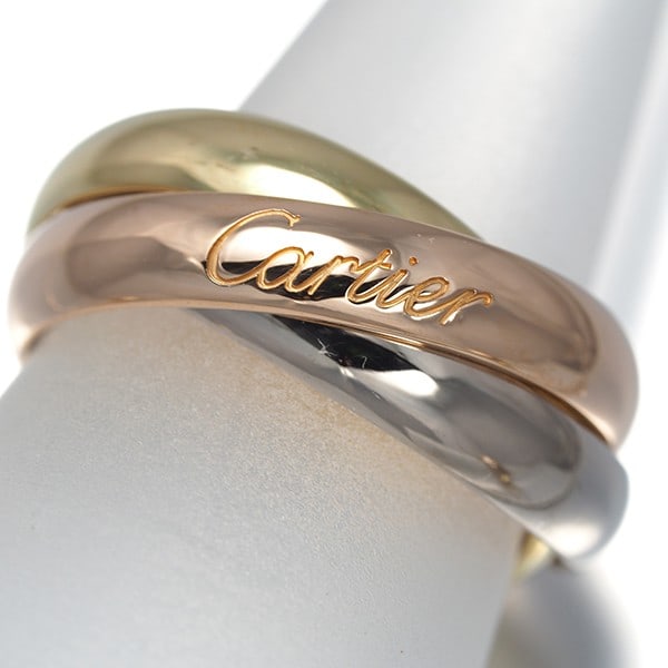 Cartier Ring Trinity 3Color Classic Eu48 18K 750 Yellow White Rose Gold: Cartier Ring Trinity 3Color Classic Eu48 18K 750 Yellow White Rose Gold Cartier's iconic Trinity ring is a masterful blend of 18k yellow, white, and rose gold, expertly crafted in a classic Eu48 desig