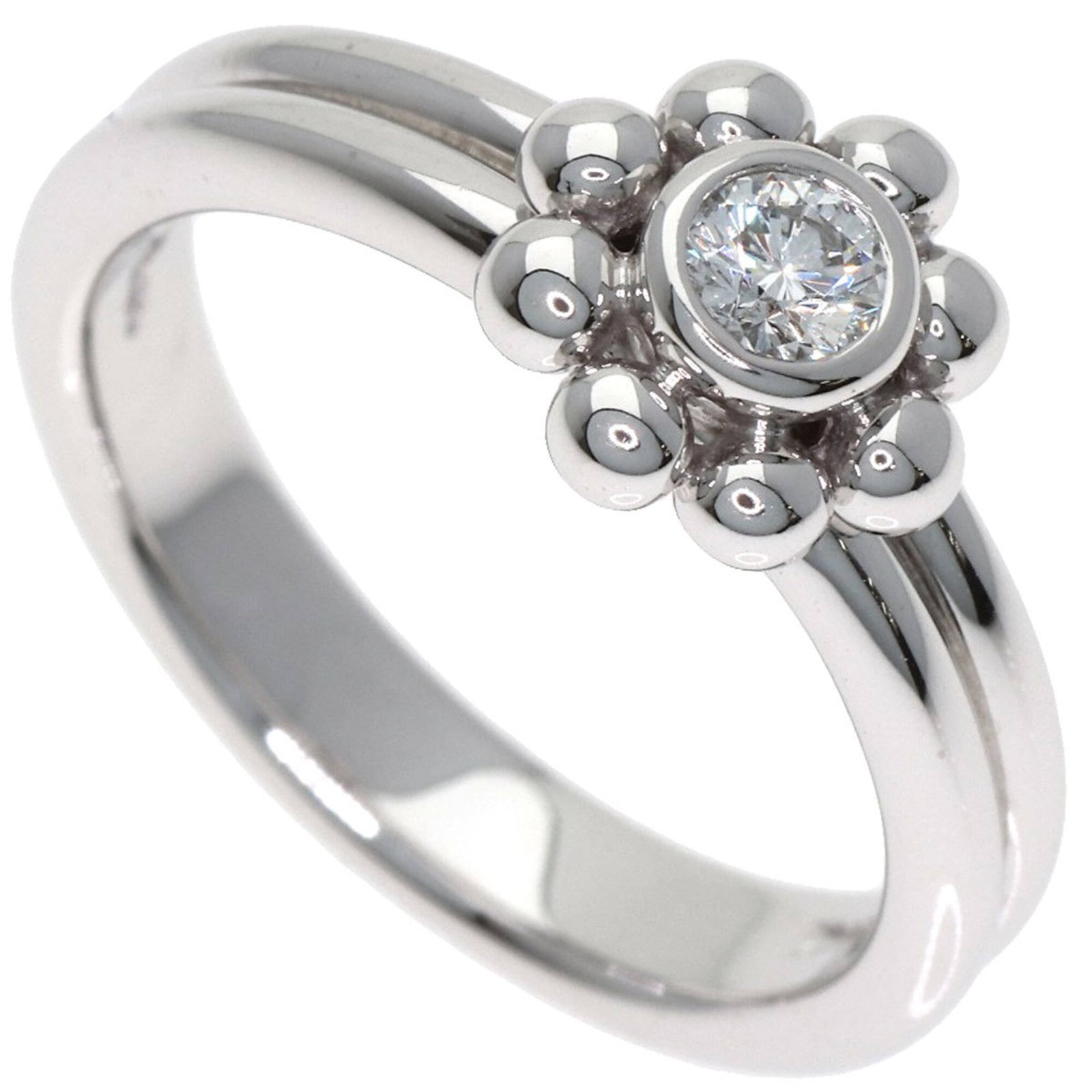 TIFFANY Band Ring White Gold (18K): TIFFANY Band Ring White Gold (18K) This 18K white gold band ring from Tiffany features a diamond stone, crafted with precision and attention to detail. In excellent condition, the ring boasts a subtle