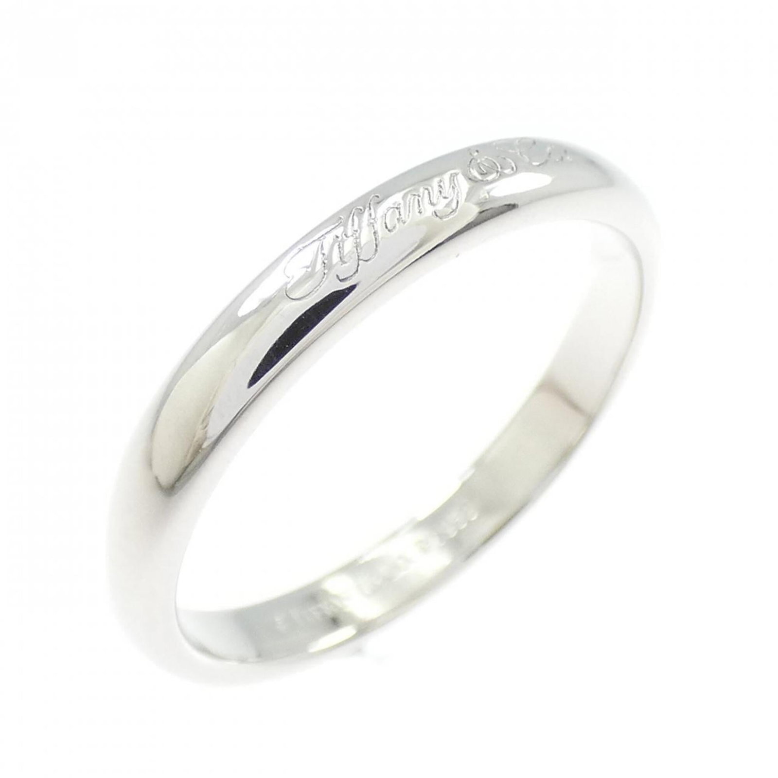 TIFFANY Band Ring Platinum 950: TIFFANY Band Ring Platinum 950 Platinum 950 Tiffany Band Ring, a timeless piece of jewelry, boasts a sleek design and premium material. The ring features a band made of 950 platinum, a rare and durabl