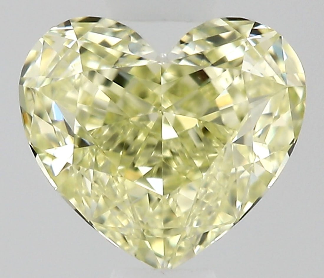 GIA Heart 0.53ct Fancy Light Yellow VVS1 - Loose Natural Diamond: GIA Heart 0.53ct Fancy Light Yellow VVS1 - Loose Natural Diamond GIA-certified, this 0.53ct Fancy Light Yellow VVS1 diamond boasts exceptional clarity and color, with a high level of polish and symmet