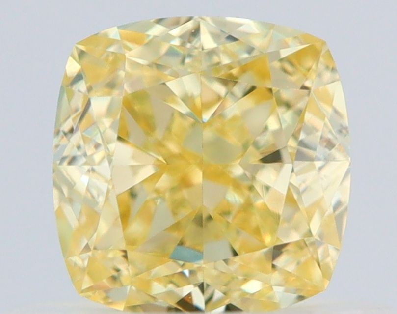 GIA Cushion Brilliant 0.58ct Fancy Yellow VVS1 - Loose Natural Diamond: GIA Cushion Brilliant 0.58ct Fancy Yellow VVS1 - Loose Natural Diamond GIA certified Fancy Yellow VVS1 diamond, measuring 4.55L x 4.49W x 3.06H, boasts a vibrant yellow hue and exceptional clarity. Th