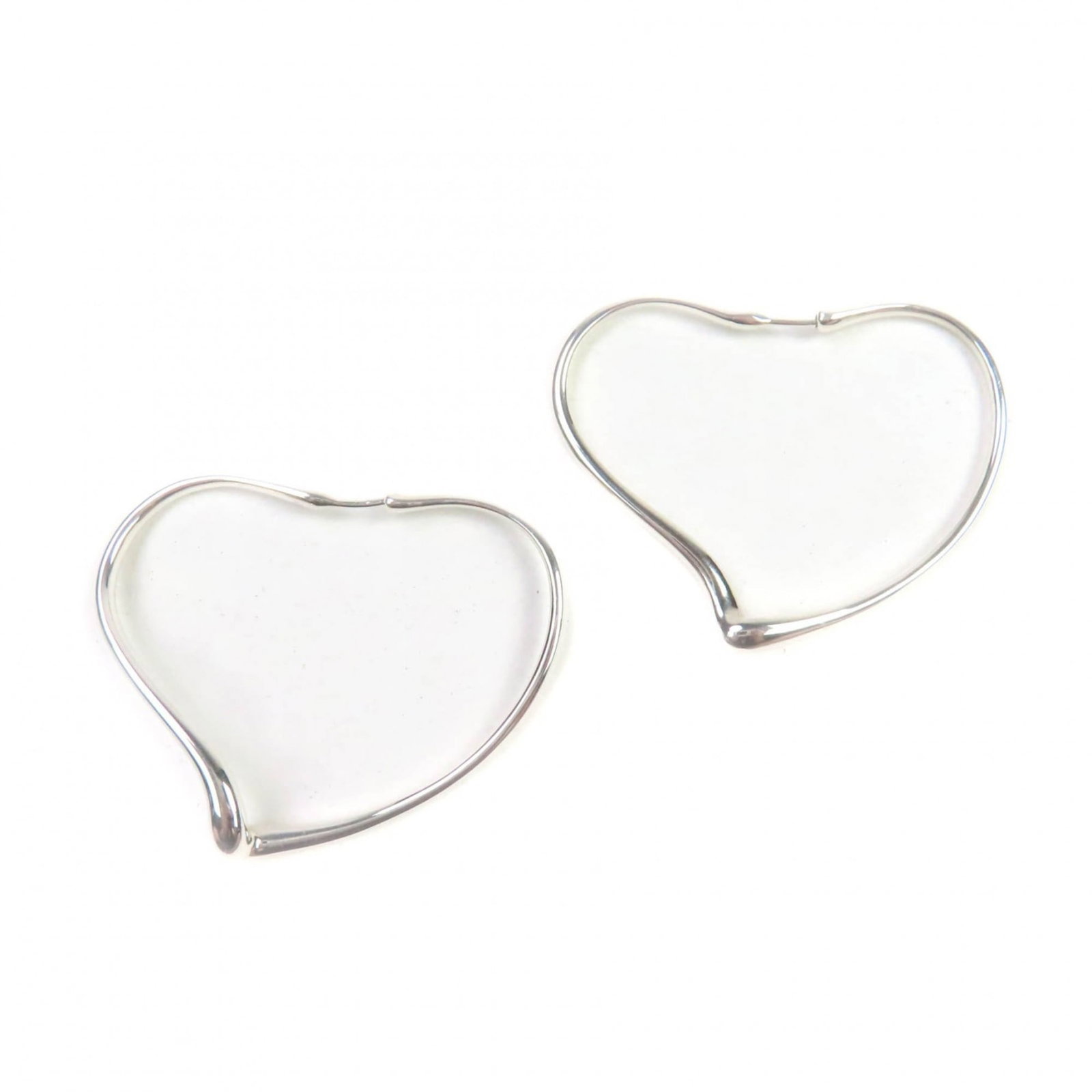 TIFFANY Hoop Earrings Silver 925: TIFFANY Hoop Earrings Silver 925 Silver 925 Tiffany Hoop Earrings - A timeless and elegant accessory, these gently used earrings feature a silver 925 construction and a classic hoop design. With minor