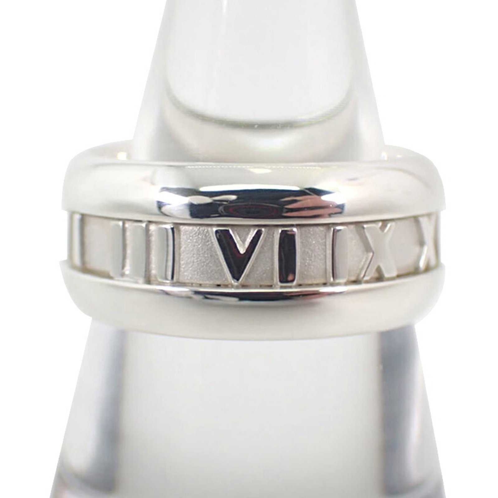 TIFFANY Band Ring Sterling Silver 925: TIFFANY Band Ring Sterling Silver 925 Sterling silver 925 band ring from Tiffany, featuring a classic design. This gently used ring shows minor signs of wear, with small scratches or light marks prese