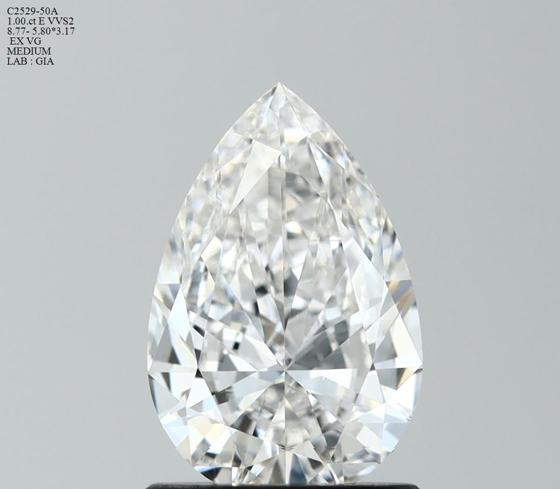 GIA Pear 1.0ct E VVS2 - Loose Natural Diamond: GIA Pear 1.0ct E VVS2 - Loose Natural Diamond GIA-certified, this 1.0ct pear-cut diamond boasts an exceptional E color, VVS2 clarity, and EX polish, making it a standout in its natural beauty. Measuri