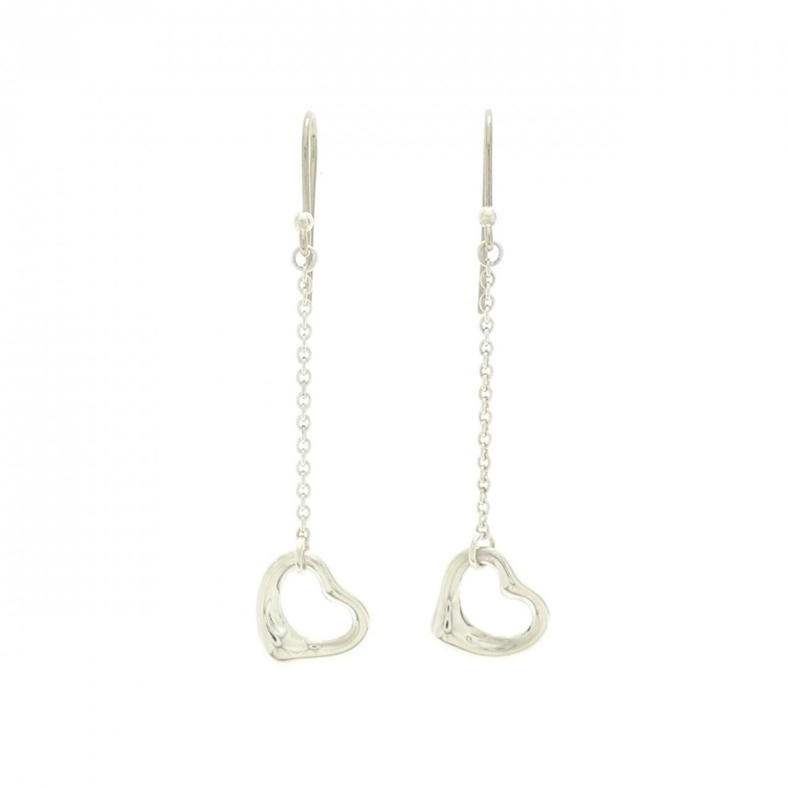 TIFFANY Stud Earrings Silver 925: TIFFANY Stud Earrings Silver 925 Silver 925 Tiffany stud earrings with a classic design, bearing a signature, are available for purchase. Gently used, they exhibit minor signs of wear, including small