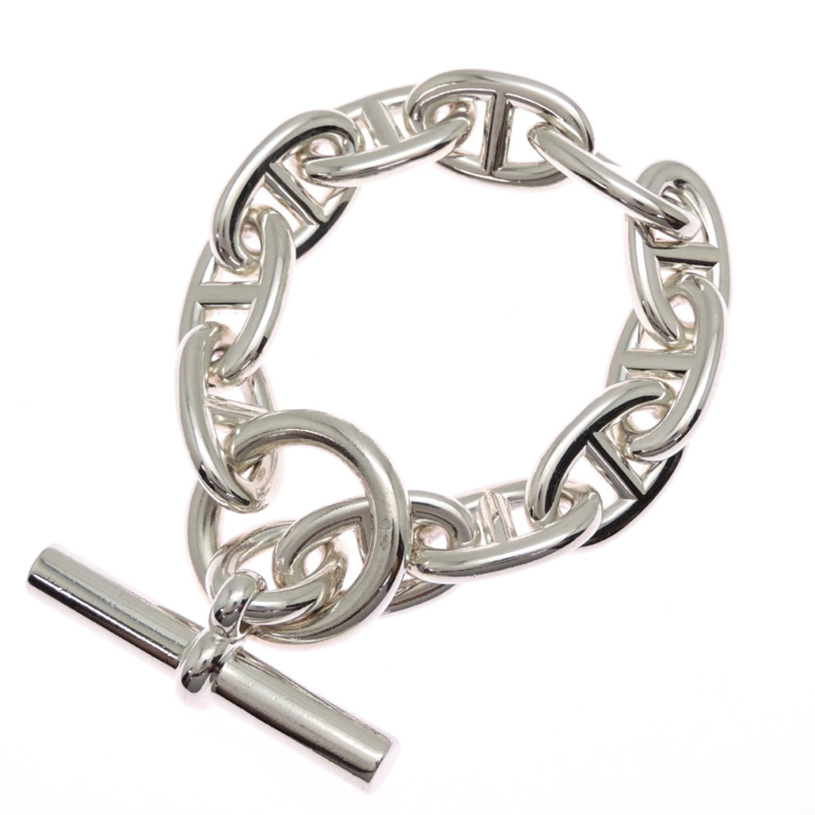 HERMES Charm Bracelet Silver 925: HERMES Charm Bracelet Silver 925 Silver 925 Charm Bracelet from Hermes, crafted in France, features a delicate 22cm length and minor signs of wear. Gently used, the item boasts a classic design with