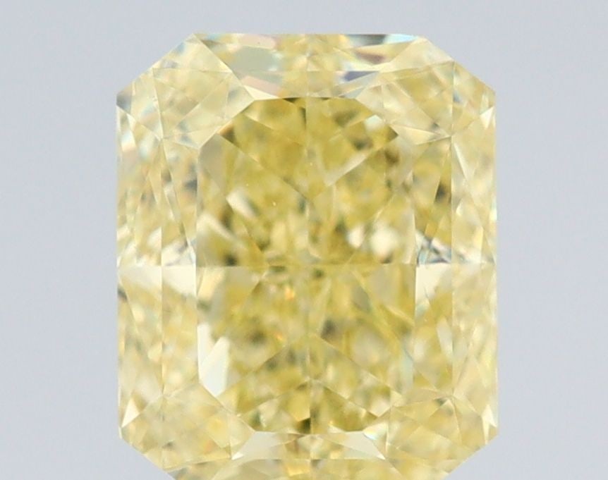 GIA Radiant 1.03ct Fancy Yellow VVS1 - Loose Natural Diamond: GIA Radiant 1.03ct Fancy Yellow VVS1 - Loose Natural Diamond GIA certification ensures this 1.03ct Fancy Yellow VVS1 diamond is a genuine, natural gemstone. With its EX polish and VG symmetry, this