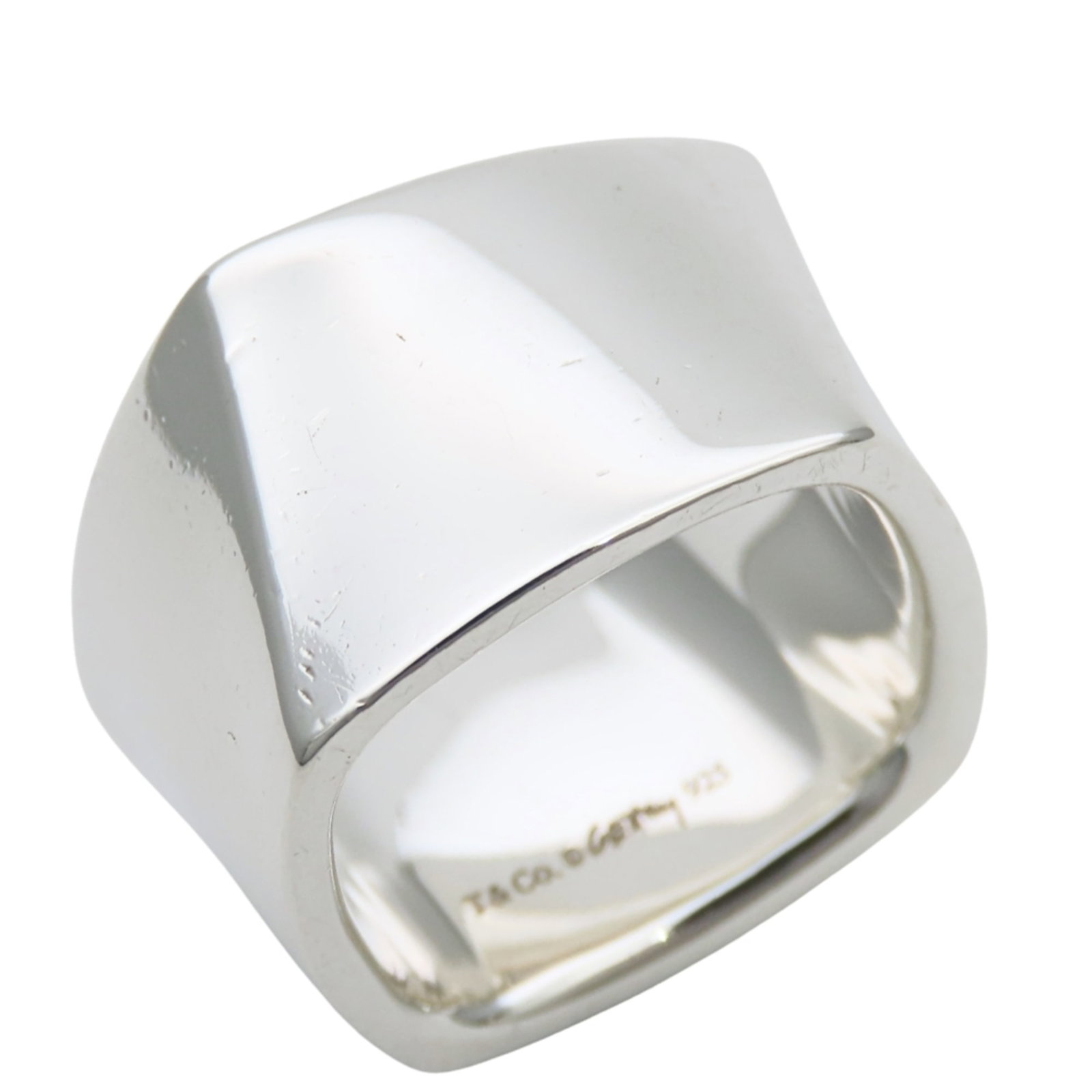 TIFFANY Band Ring Silver 925: TIFFANY Band Ring Silver 925 Silver 925 band ring from Tiffany, a classic design with visible wear, scratches, and scuffs. The item is fully functional and in good overall condition, bearing a