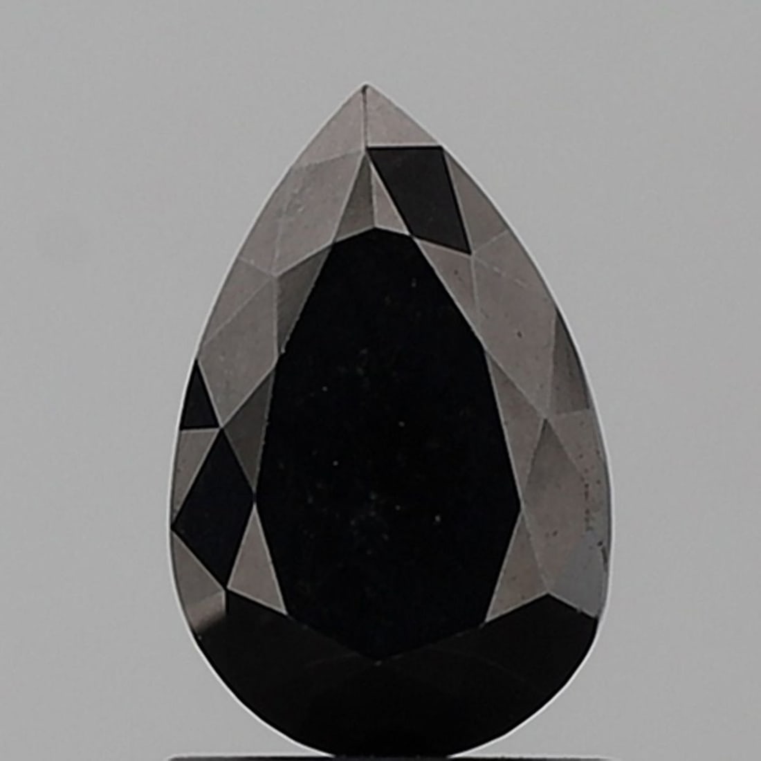 Pear 1.25ct Black VVS2 - Loose Natural Diamond: Pear 1.25ct Black VVS2 - Loose Natural Diamond 1.25ct Black VVS2 - Loose Natural Diamond, showcasing exceptional clarity and polish, with a mesmerizing black color that sets it apart from traditional