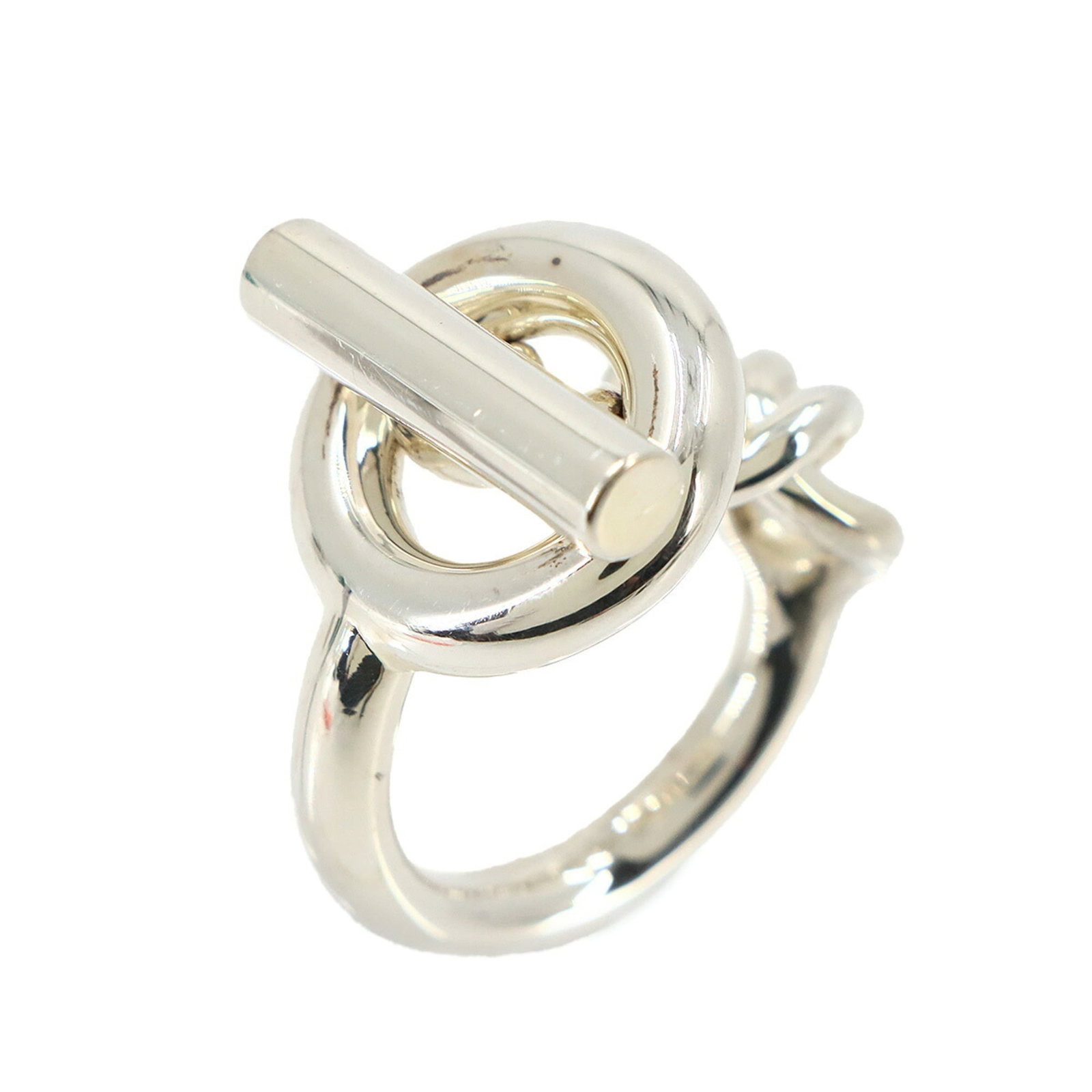 HERMES Band Ring Silver 925: HERMES Band Ring Silver 925 Silver 925 band ring from Hermes, a high-quality material with a 55 US size and 7.5 condition, bearing a faint trace of refurbishment. The ring is made of silver and featur