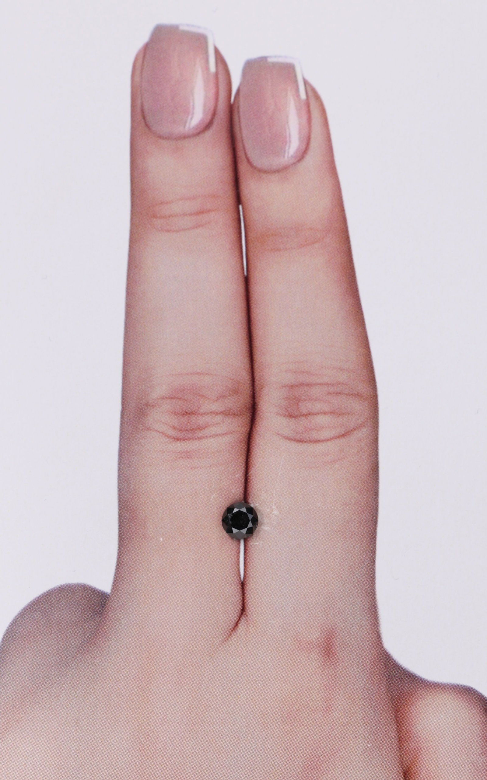 Round 0.42ct Fancy Black VVS2 - Loose Natural Diamond: Round 0.42ct Fancy Black VVS2 - Loose Natural Diamond 0.42ct Fancy Black VVS2 - Loose Natural Diamond. This exquisite diamond boasts a Fancy Black color, exceptional clarity (VVS2) and EX polish,