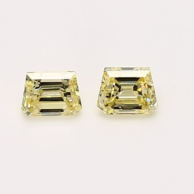 GIA Tapered Baguette 0.23ct Fancy Yellow VVS2 - Loose Natural Diamond: GIA Tapered Baguette 0.23ct Fancy Yellow VVS2 - Loose Natural Diamond GIA certified Fancy Yellow diamond, measuring 2.91L x 3.78W x 2.34H, boasts exceptional clarity with a VVS2 grade and a GD