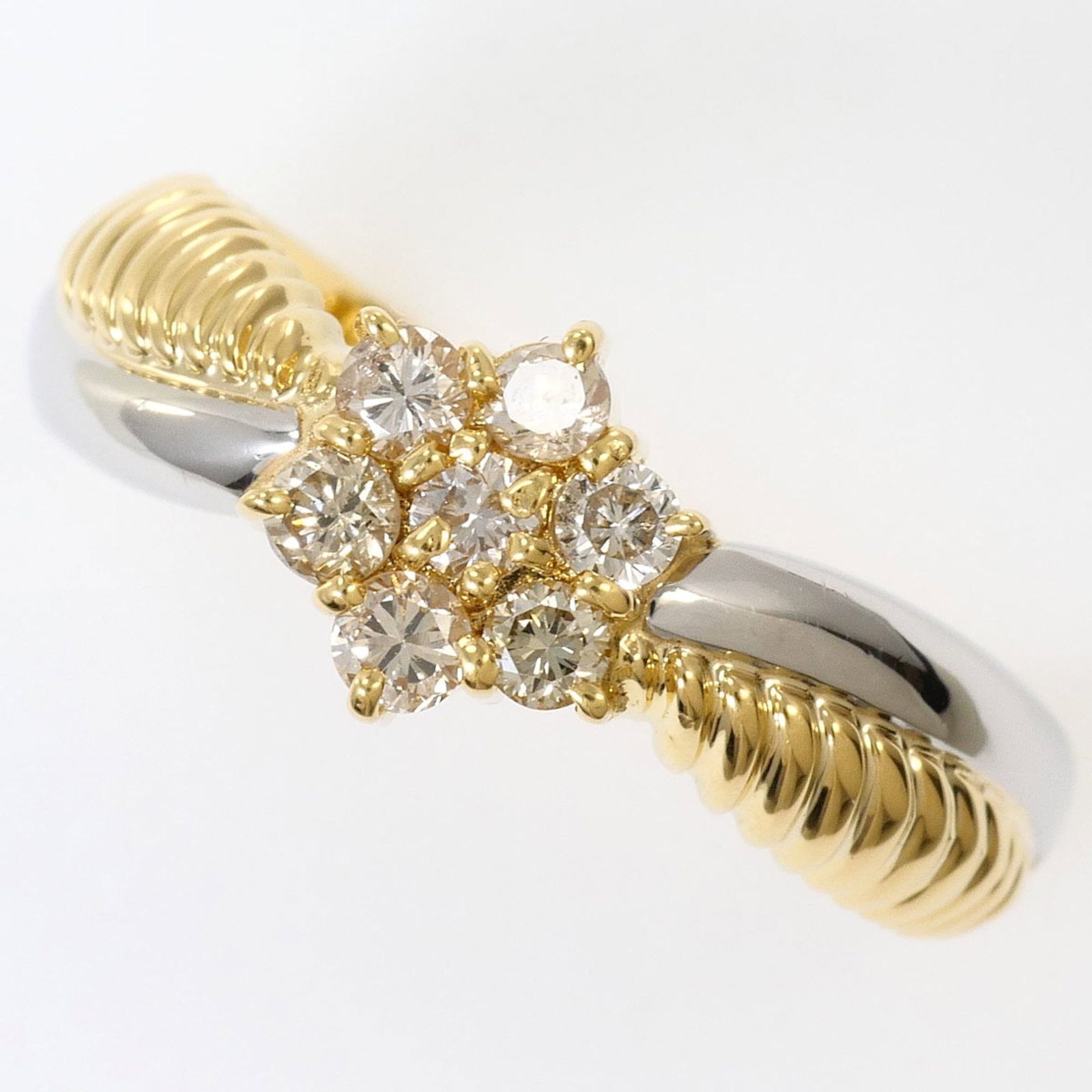 Band Ring Platinum 900 Yellow Gold (18K): Band Ring Platinum 900 Yellow Gold (18K) Platinum 900 Yellow Gold band ring boasts a striking combination of 18K gold and platinum, creating a luxurious and modern look. The 0.30ct diamond adds a