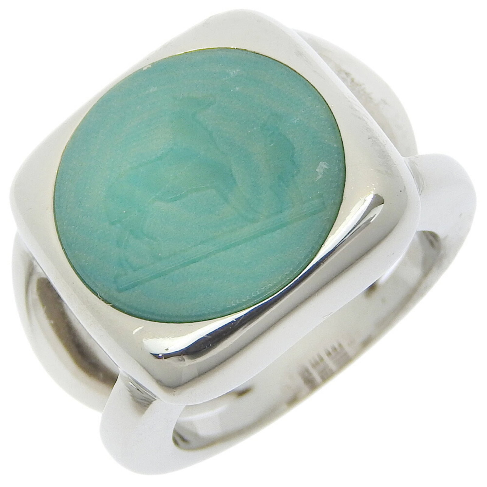 HERMES Band Ring Metal: HERMES Band Ring Metal Green Hermes Band Ring Metal, a stylish and elegant accessory, features a metal band ring with a subtle green hue. Gently used with minor signs of wear, this item is in very