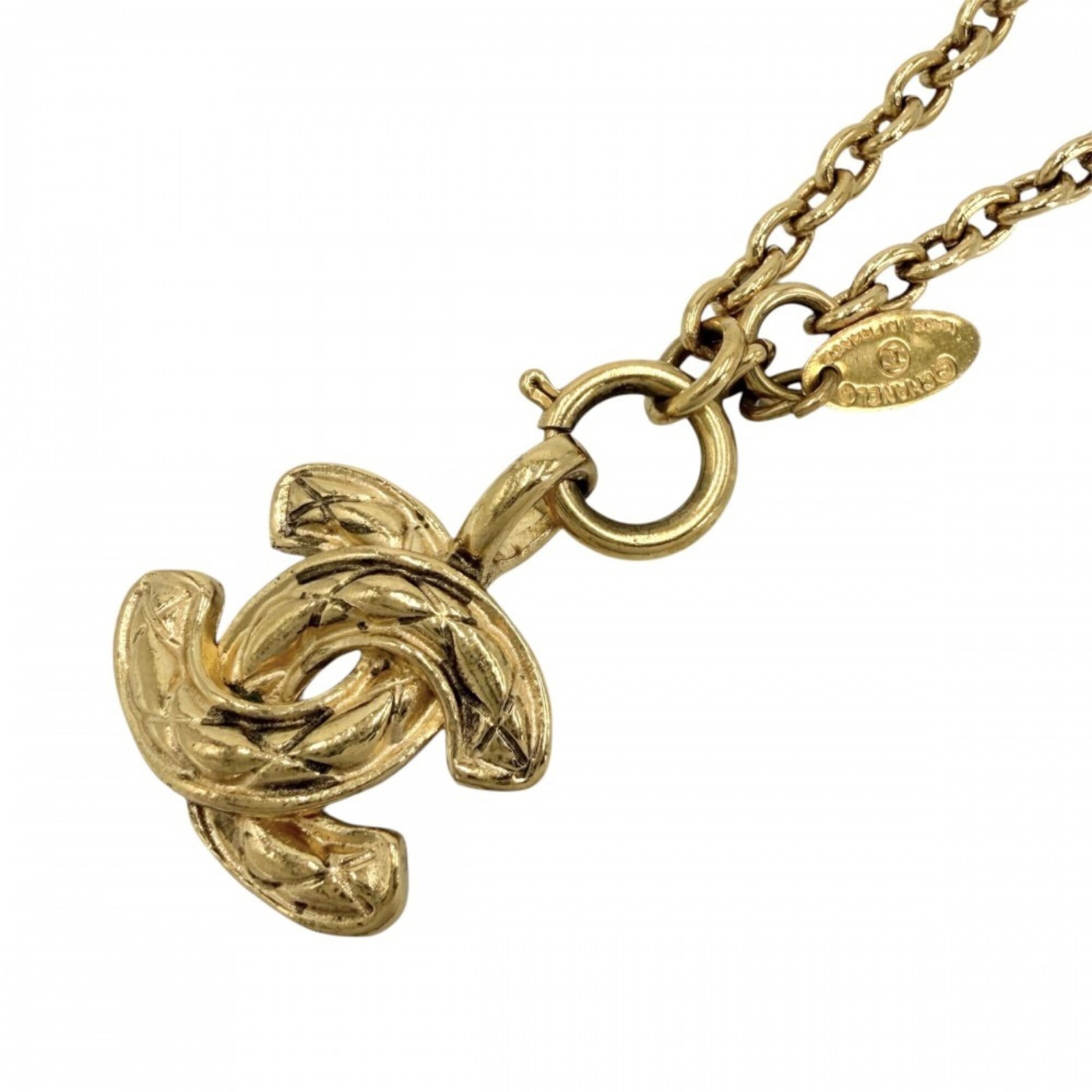 CHANEL Gold Plating: CHANEL Gold Plating Gold plating adorns this Chanel necklace, adding a touch of luxury to any outfit. The 55.5 cm chain and 20mm x 25mm pendant provide a stylish and versatile accessory. With visible