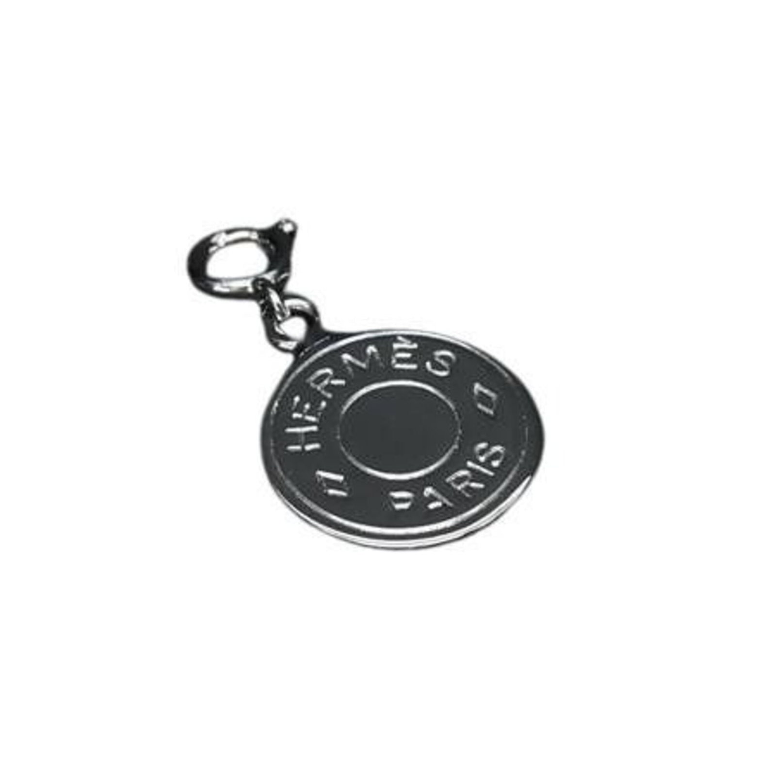 HERMES Metal Pendant: HERMES Metal Pendant 25mm x 15mm metal pendant from Hermes, a brand known for its high-quality designs. This pendant is made from metal and is in like new condition, with only the faintest traces of