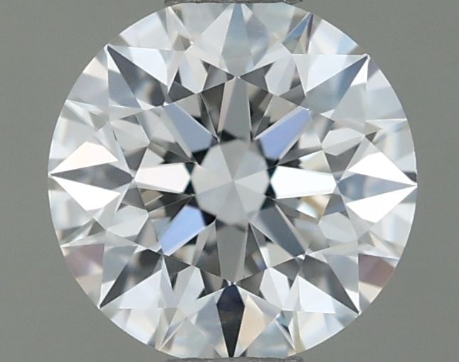 IGI Round 0.7ct E VVS2 - Loose Natural Diamond: IGI Round 0.7ct E VVS2 - Loose Natural Diamond 0.7ct E VVS2 - A Rare and Exceptional DiamondEX Cut, EX Symmetry, and EX Polish make this IGI certified diamond a standout. Measuring 5.67L x 5.69W x