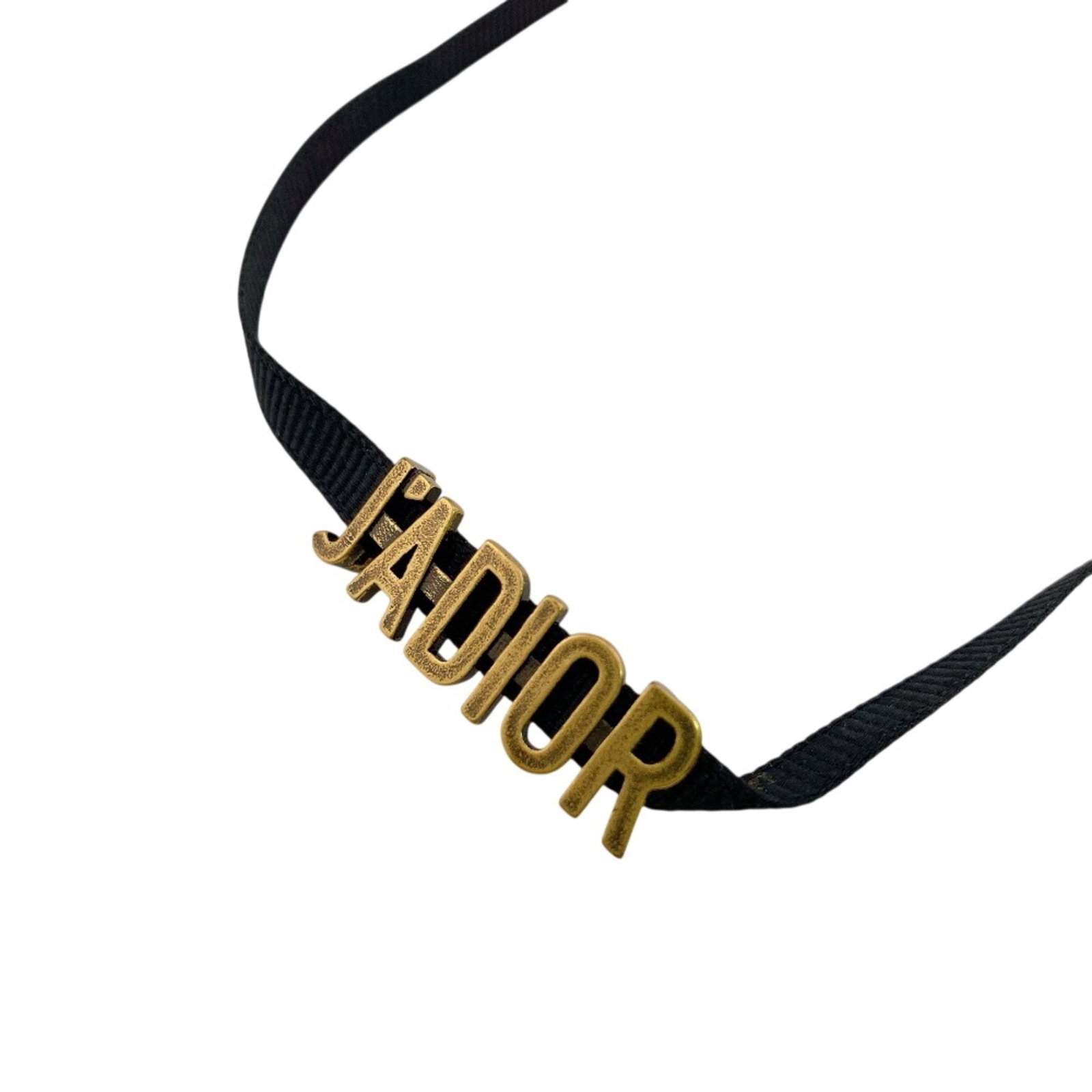 CHRISTIAN DIOR Gold Plating: CHRISTIAN DIOR Gold Plating Gold plating on a Christian Dior choker necklace with a black and gold design, available in a 38 cm circumference. The item bears visible signs of wear, including scratches