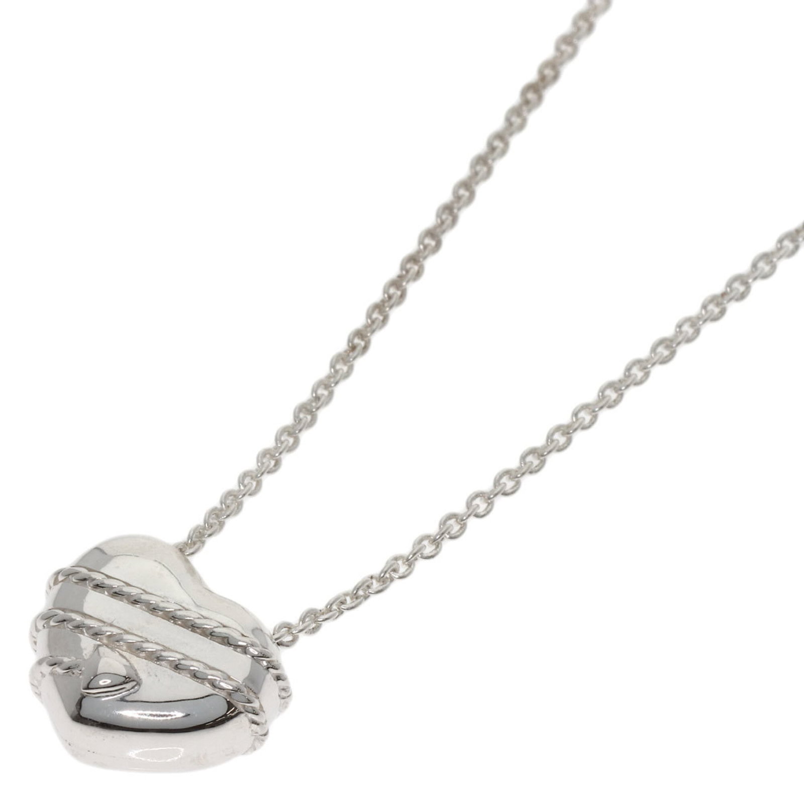 TIFFANY Silver Necklace: TIFFANY Silver Necklace The Tiffany Silver Necklace is a beautiful piece, bearing a signature, made from high-quality silver. Its 40.5 cm chain and 12.8mm x 15.7mm pendant make it a stylish accessory 