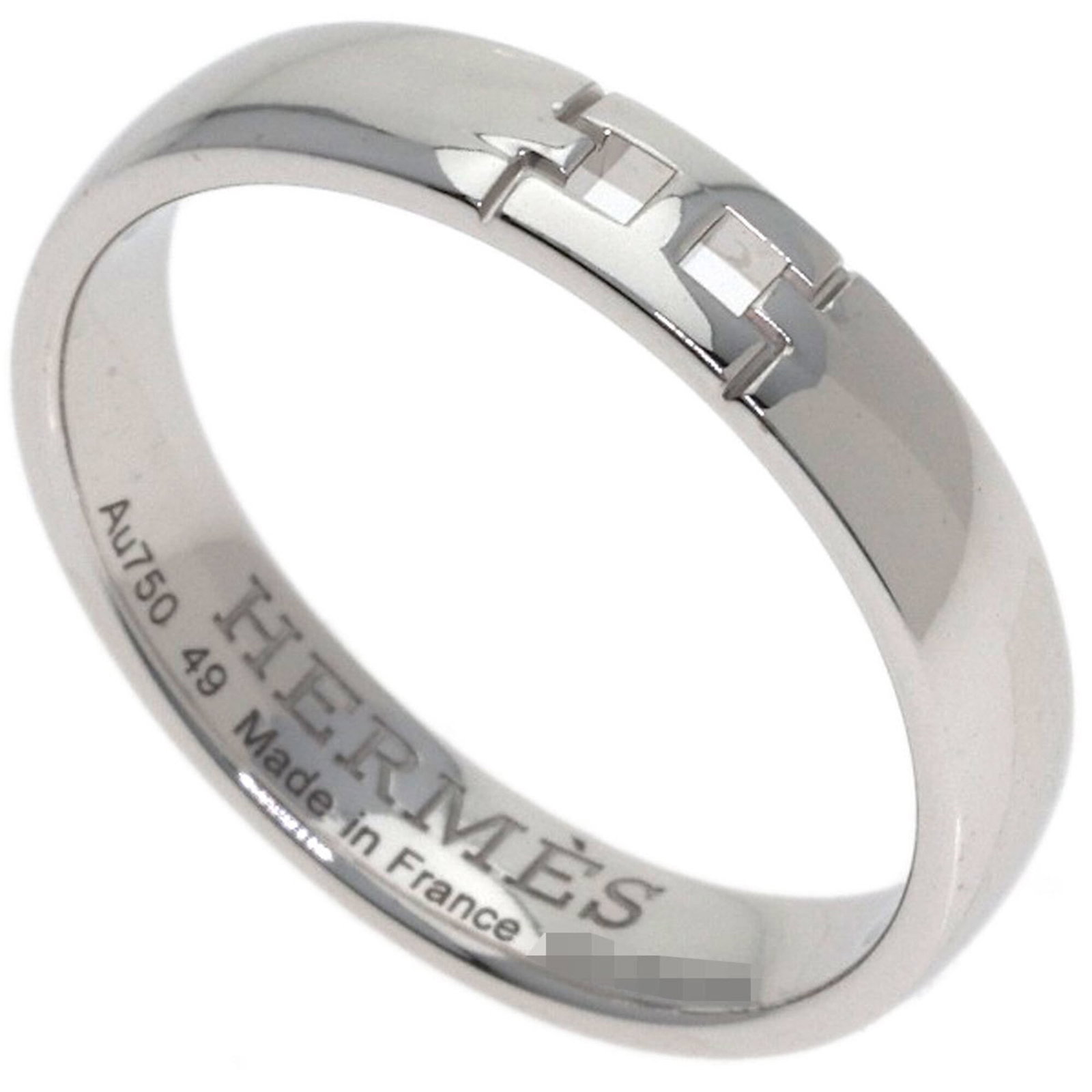HERMES Band Ring White Gold (18K): HERMES Band Ring White Gold (18K) 18K white gold band ring from Hermes, featuring a classic design. Gently used with minor signs of wear, this ring is in very good condition with small scratches or li