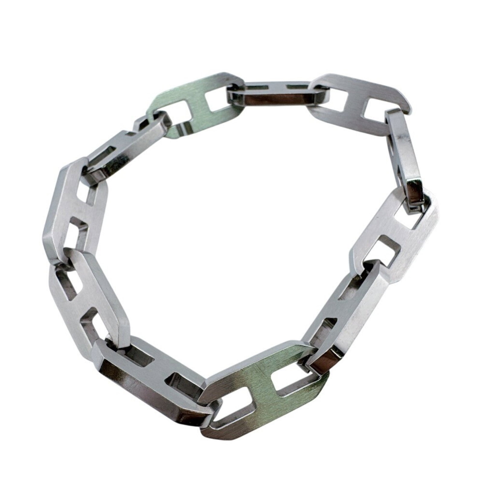 HERMES Charm Bracelet Silver 925: HERMES Charm Bracelet Silver 925 Silver 925 Charm Bracelet from Hermes, featuring a classic design with visible wear and scratches. The total length is 20cm, making it a versatile accessory for