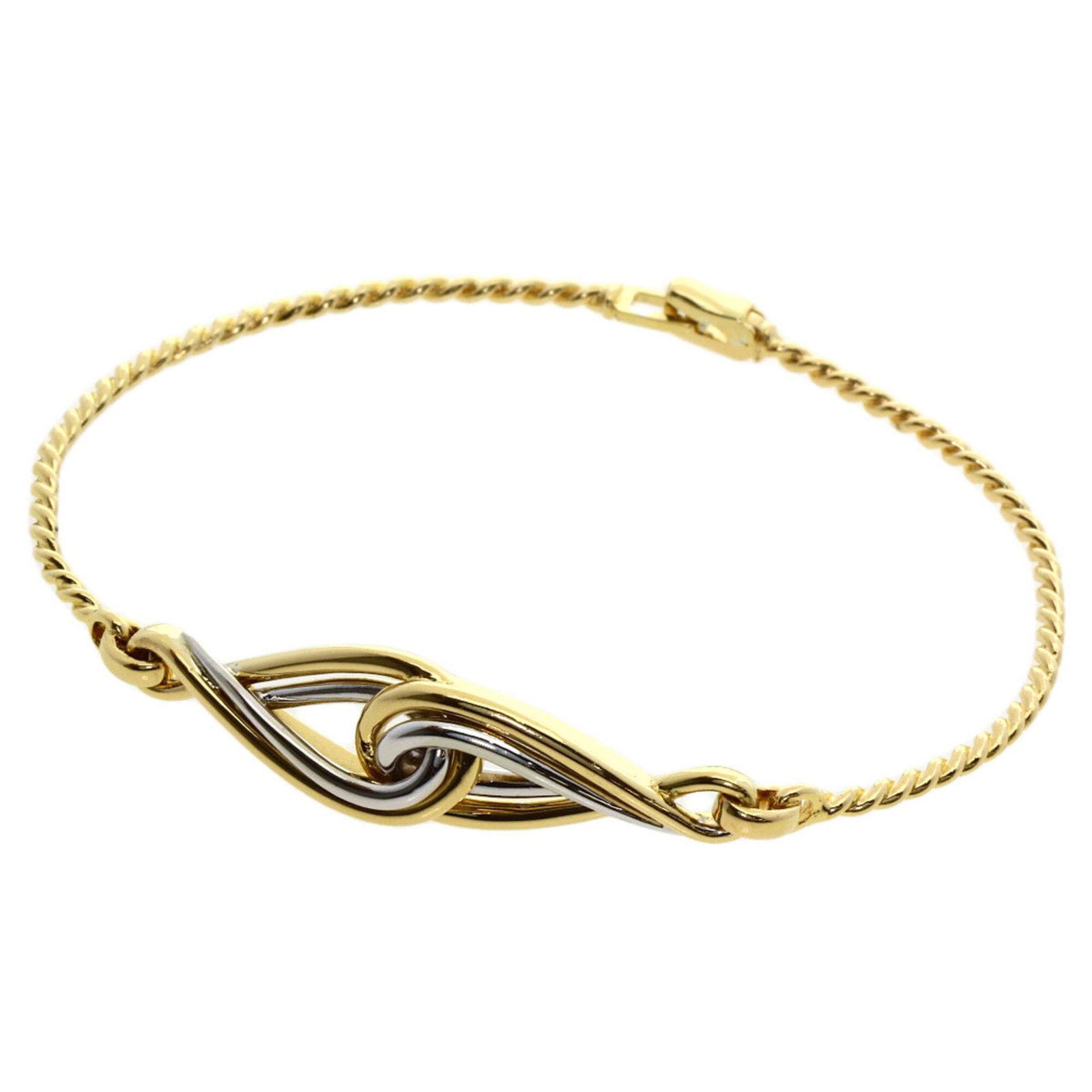 CHRISTIAN DIOR Charm Bracelet White Gold (18K) Yellow Gold (18K): CHRISTIAN DIOR Charm Bracelet White Gold (18K) Yellow Gold (18K) White gold (18K) and yellow gold (18K) charm bracelet from Christian Dior, featuring a sleek and sophisticated design. This 17.5cm / 6.