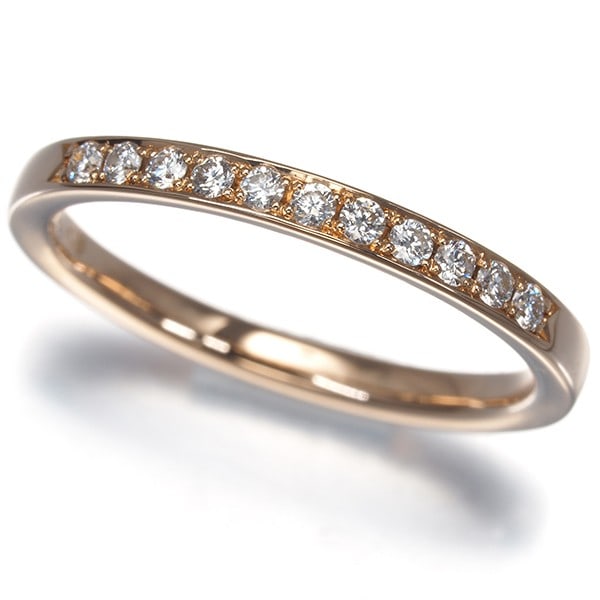 Ring Diamond Half Eternity Us4.5 18K 750 Rose Gold: Ring Diamond Half Eternity Us4.5 18K 750 Rose Gold Rose Gold Half Eternity Ring with Natural Diamond. This 18k rose gold ring features a natural diamond set in a half eternity design, weighing 1.9g.