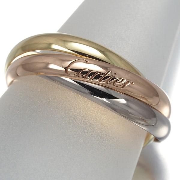 Cartier Ring Trinity 3Color Sm Eu54 18K 750 Yellow White Rose Gold: Cartier Ring Trinity 3Color Sm Eu54 18K 750 Yellow White Rose Gold Cartier's iconic Trinity ring is a masterclass in multi-tonal elegance, featuring 18k yellow, white, and rose gold in a harmonious bl