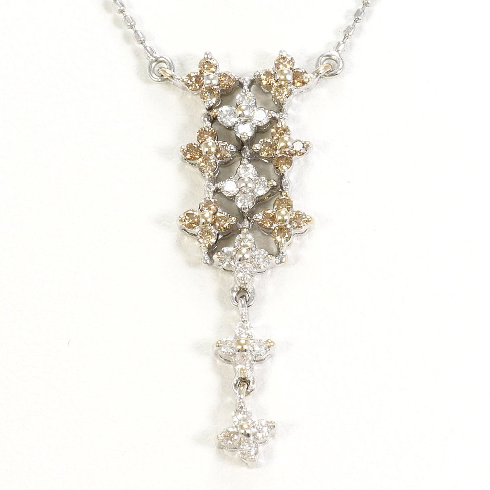 Platinum 850 Brown Platinum: Platinum 850 Brown Platinum Platinum 850 Brown Platinum Necklace is a stunning piece featuring a 3.1g diamond pendant set in 41cm platinum chain. The necklace boasts a rich, warm brown color with a