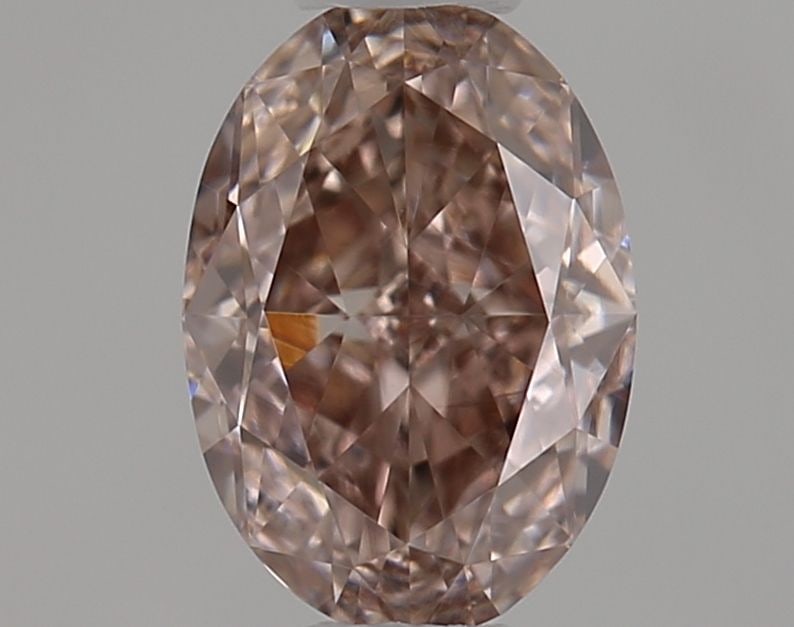 GIA Oval 0.41ct Fancy Brown Pink VVS2 - Loose Natural Diamond: GIA Oval 0.41ct Fancy Brown Pink VVS2 - Loose Natural Diamond GIA Oval 0.41ct Fancy Brown Pink VVS2 - Loose Natural Diamond. This exquisite oval-cut diamond boasts a unique Fancy Brown Pink color and 