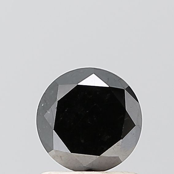 Round 1.01ct Black VVS2 - Loose Natural Diamond: Round 1.01ct Black VVS2 - Loose Natural Diamond 1.01ct Round Black Diamond with Exceptional Clarity and Polish, Measuring 6.16L x 6.11W x 3.91H. This Natural Fancy Diamond boasts a VVS2 Clarity and EX