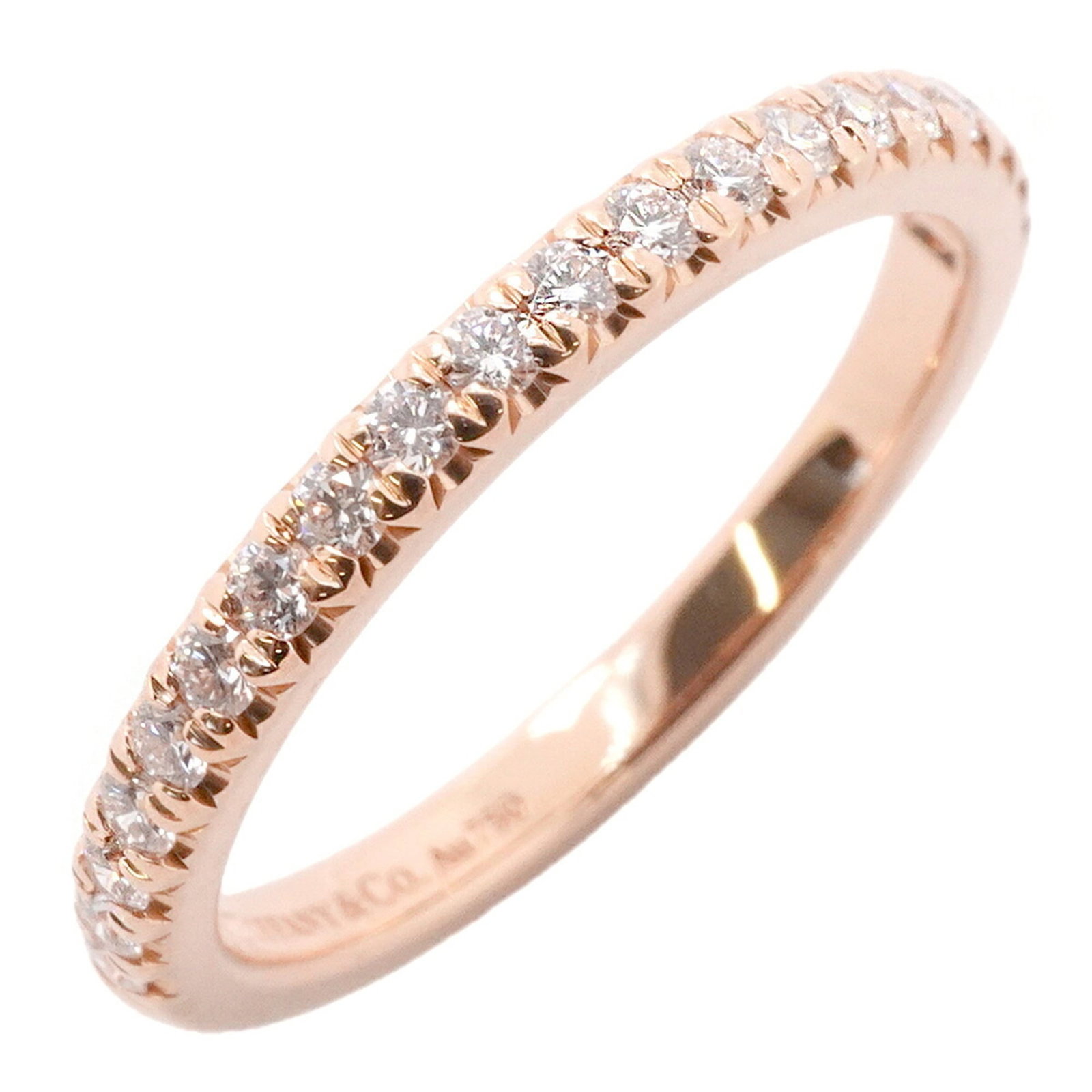TIFFANY Band Ring Pink Gold (18K): TIFFANY Band Ring Pink Gold (18K) Pink gold (18K) band ring from Tiffany, featuring a diamond stone, available in US size 3.5. The ring bears visible wear, including scratches and scuffs, and is in go