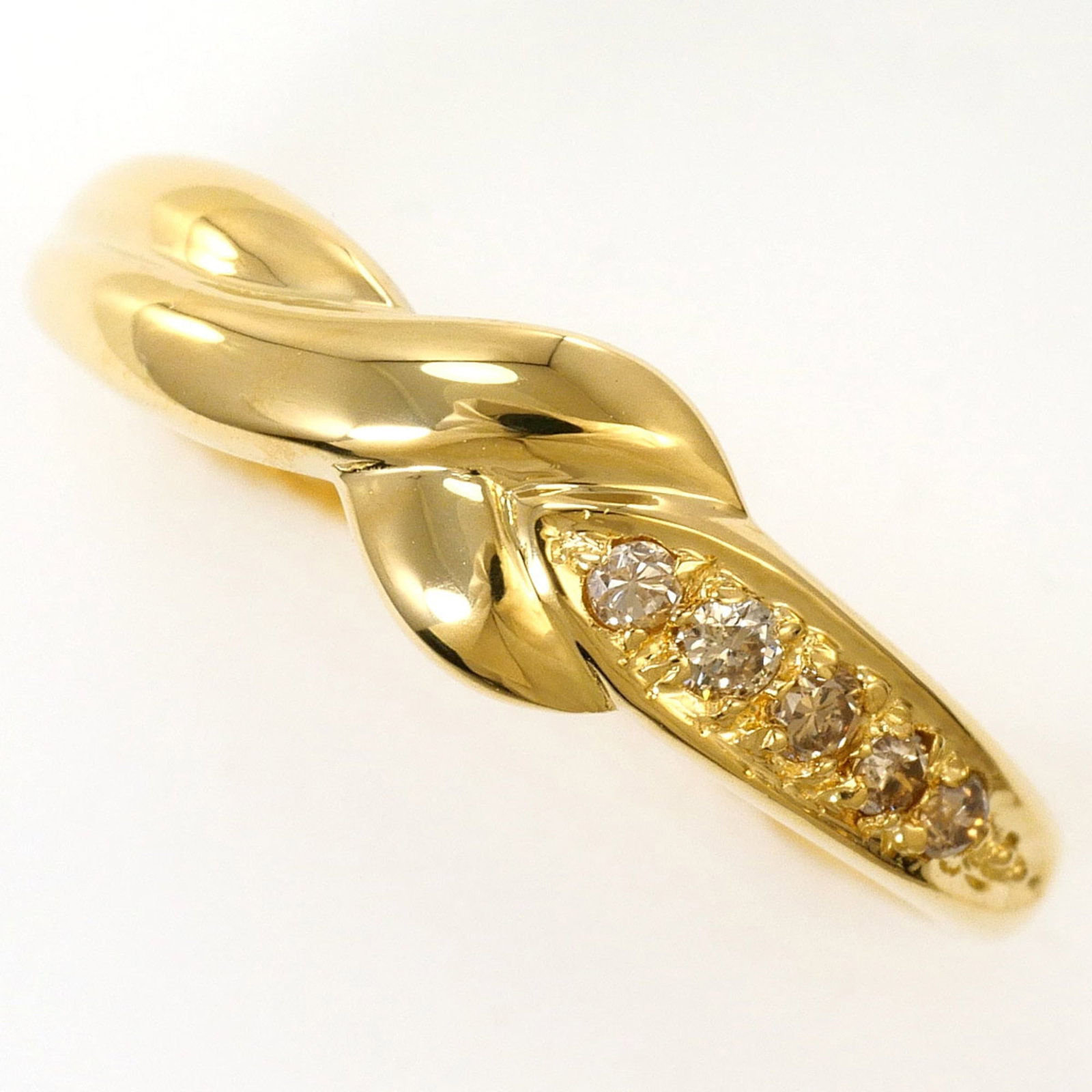 Band Ring Yellow Gold (18K): Band Ring Yellow Gold (18K) Yellow gold band ring in excellent condition, featuring a 0.08ct diamond and measuring 5mm in width, available in size 5.5. Made from 18K yellow gold, this band ring offers