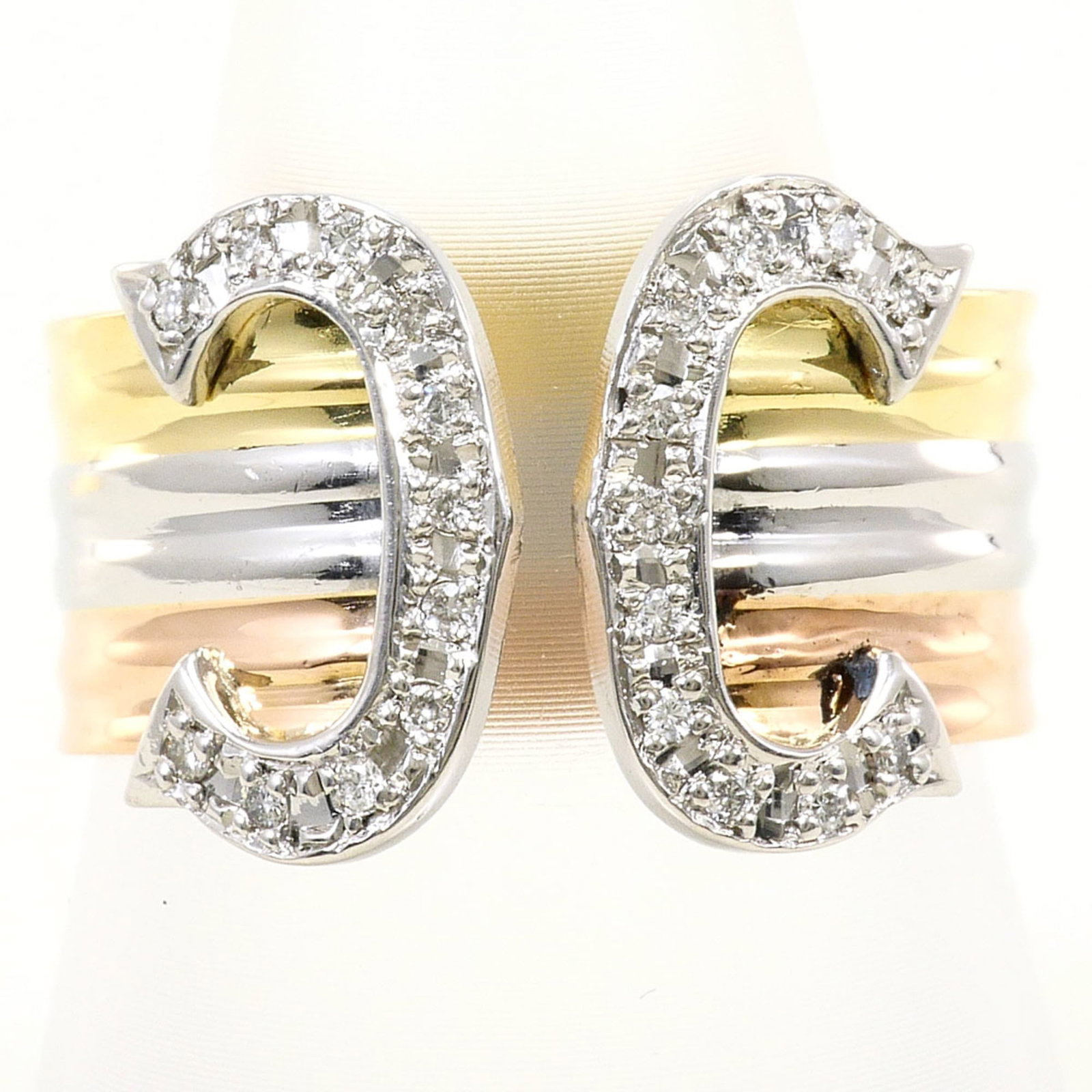 Band Ring Pink Gold (18K) Platinum 900 Yellow Gold (18K): Band Ring Pink Gold (18K) Platinum 900 Yellow Gold (18K) Pink gold, Platinum, and Yellow gold come together in this elegant 18K band ring, featuring a 0.15ct diamond. The ring boasts a slender 7mm